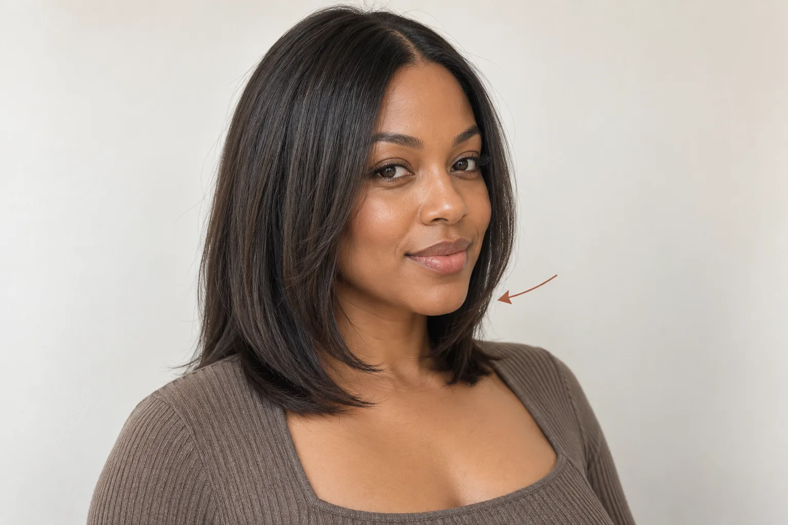 Chin-level front pieces connecting into a longer shoulder-length outline