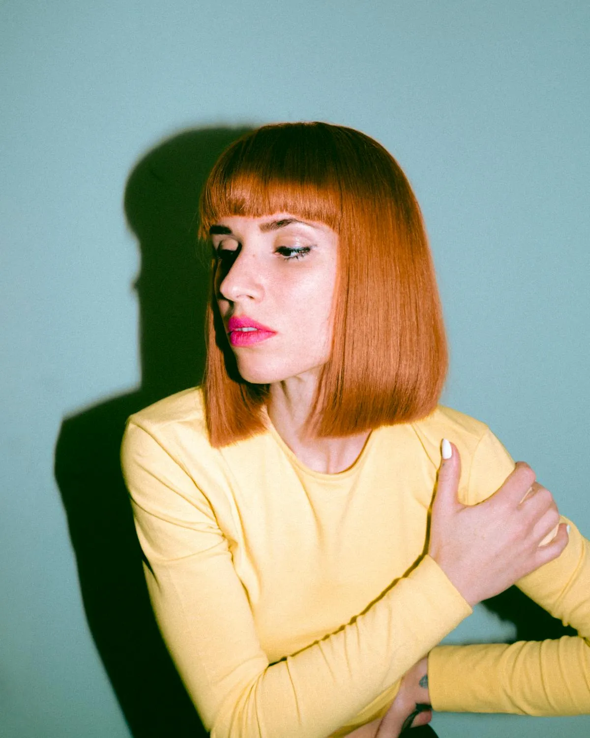 Woman with an angled bob haircut showing sharp asymmetry and clean lines — photo by Lany-Jade Mondou on Pexels
