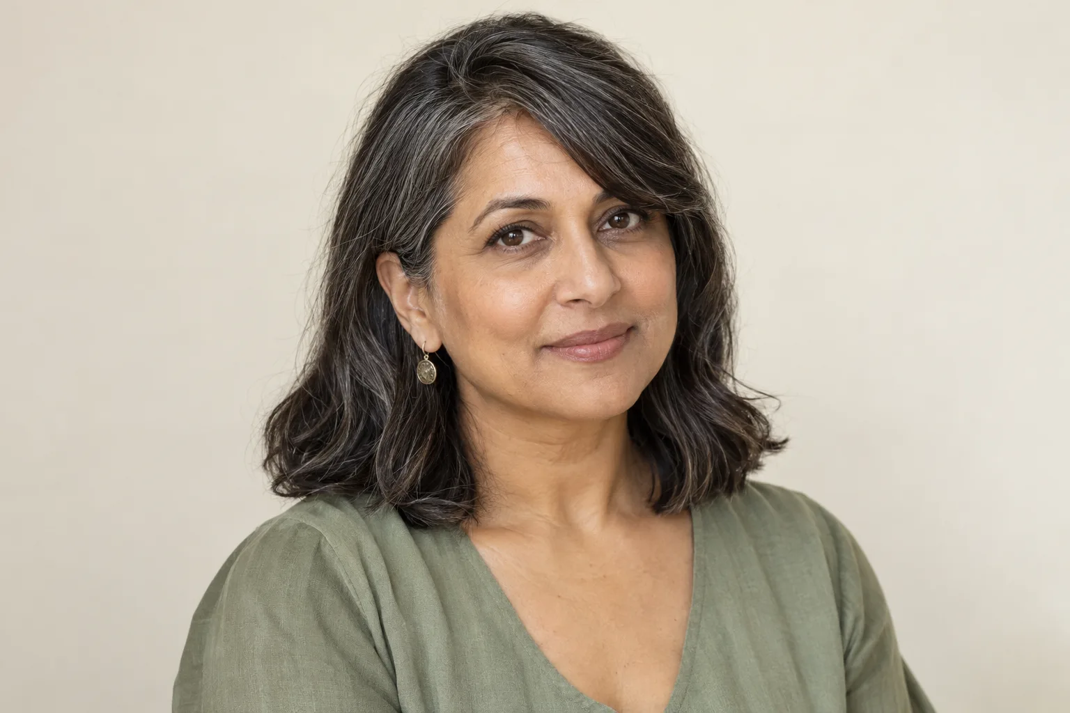 Side-swept fringe following a side part across the forehead